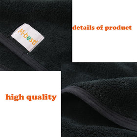 M-bestl model wearing the towel wrap in bathroom showing stable fit and frizz-reducing benefit