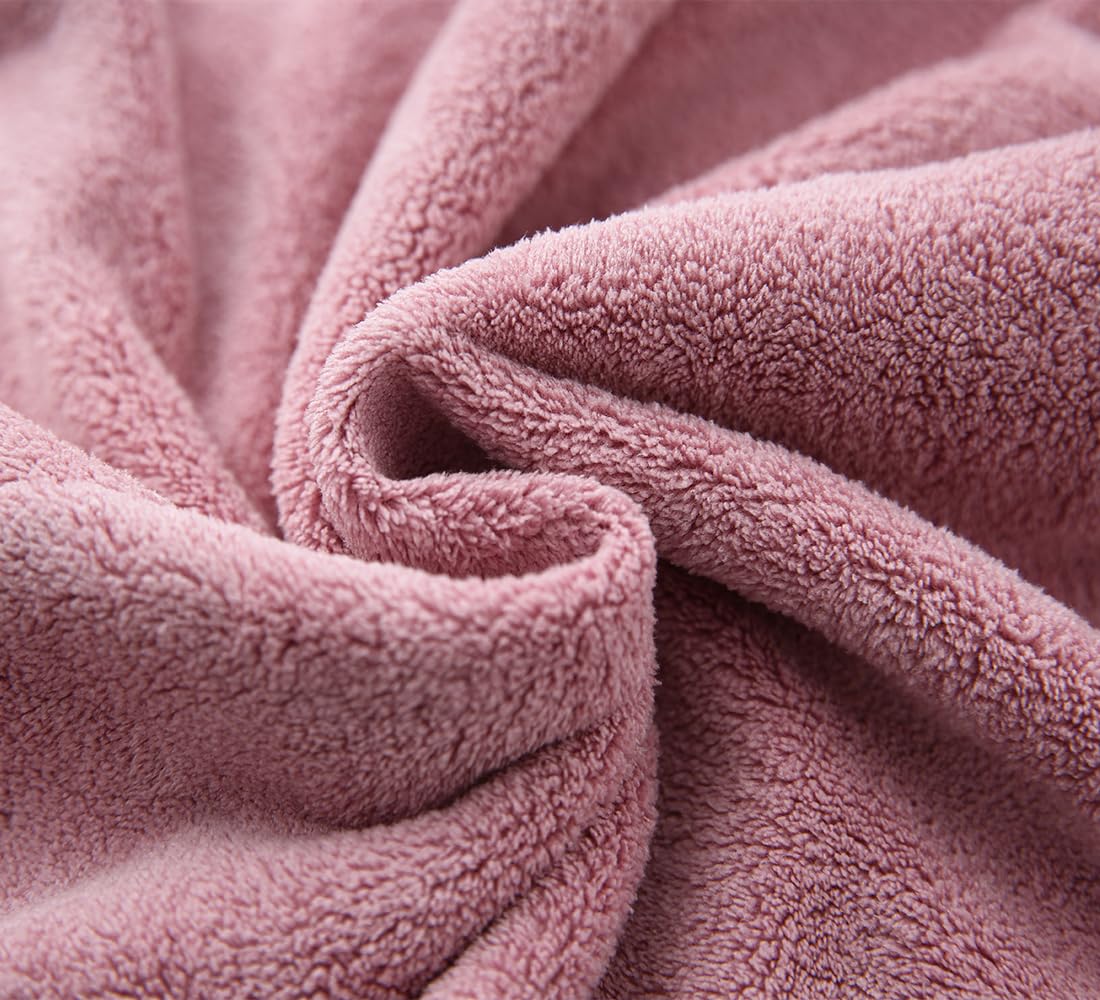 M-bestl woman wearing towel wrap after shower demonstrating hands-free drying benefit