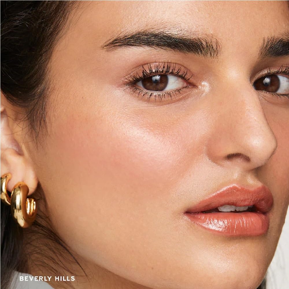 M Flush Balm being blended on cheek showing natural glow and buildable color benefit radiant look
