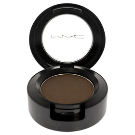 MAC Brun pan close-up revealing smooth texture and true brown pigment for blendable application