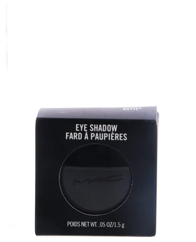 MAC Carbon close-up of powder texture revealing fine-milled pigment and smooth blendability benefit