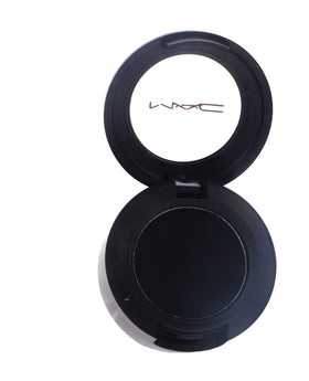 MAC Carbon front pan showing deep matte black pigment and clean packaging benefit: clear color reference