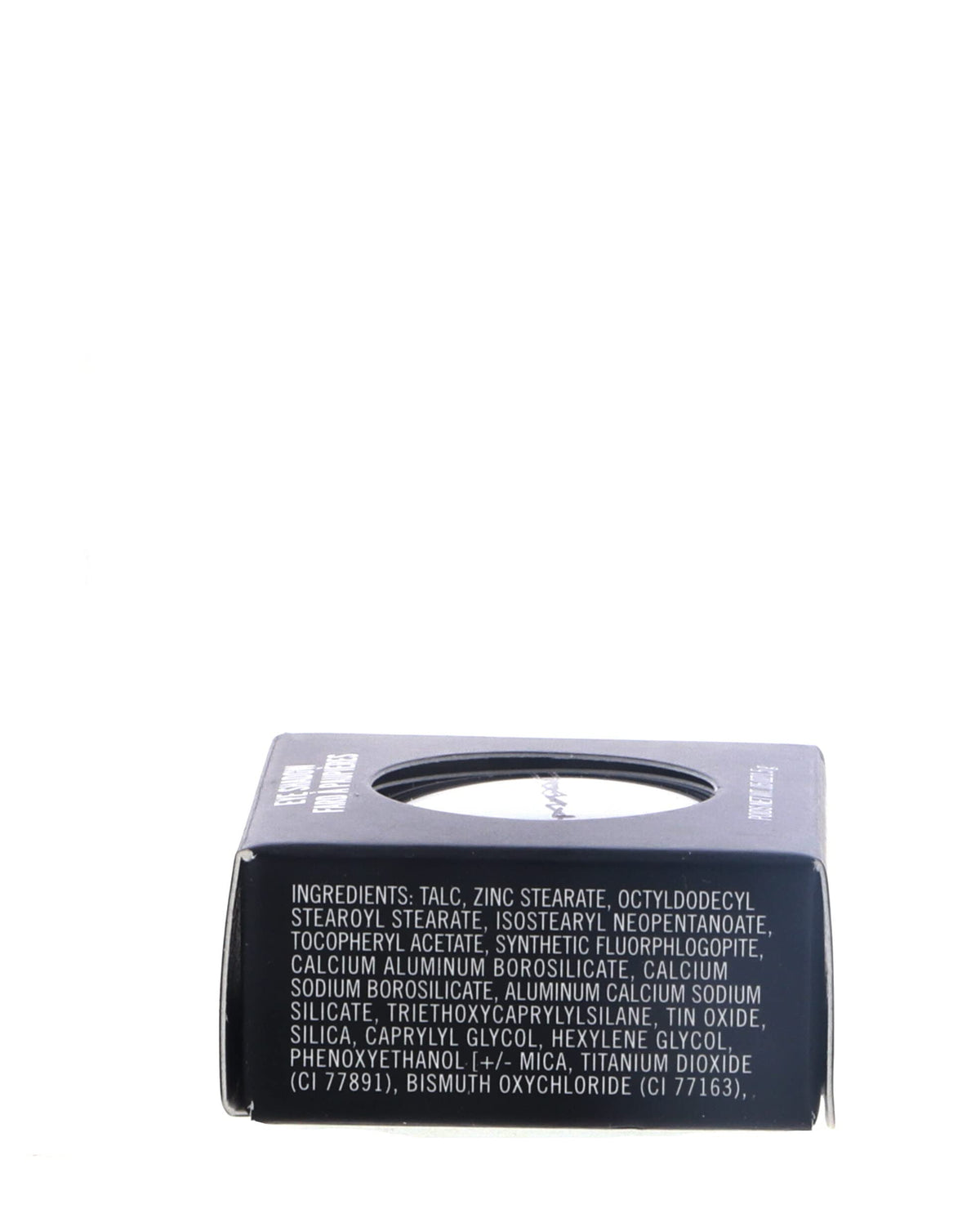 MAC Carbon next to ruler showing scale and compact packaging for easy travel benefit