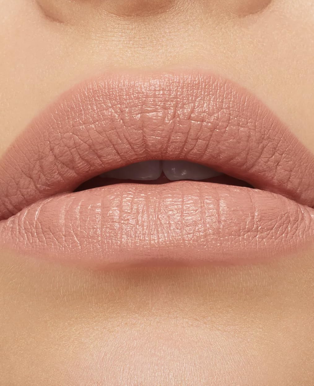 MAC Honeylove applied on lips showing full-coverage rose shade and hydrated look