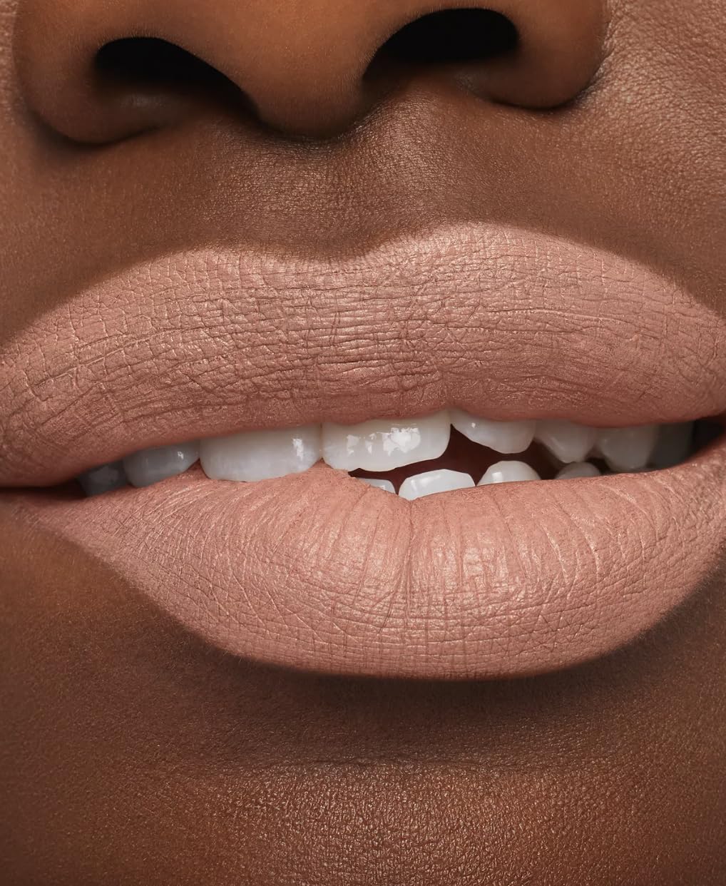 MAC Honeylove texture close-up highlighting silky-matte finish and smooth application