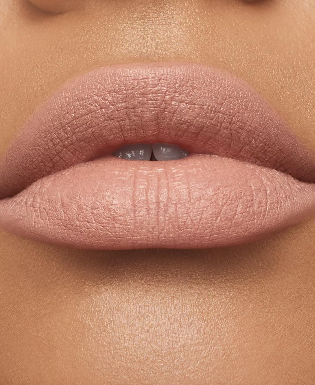 MAC Honeylove swatch on forearm demonstrates true rose pigment and lasting color