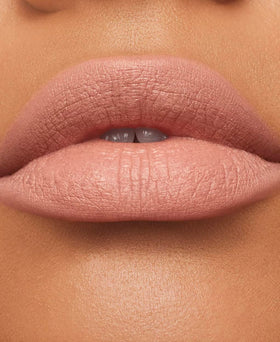 MAC Honeylove swatch on forearm demonstrates true rose pigment and lasting color