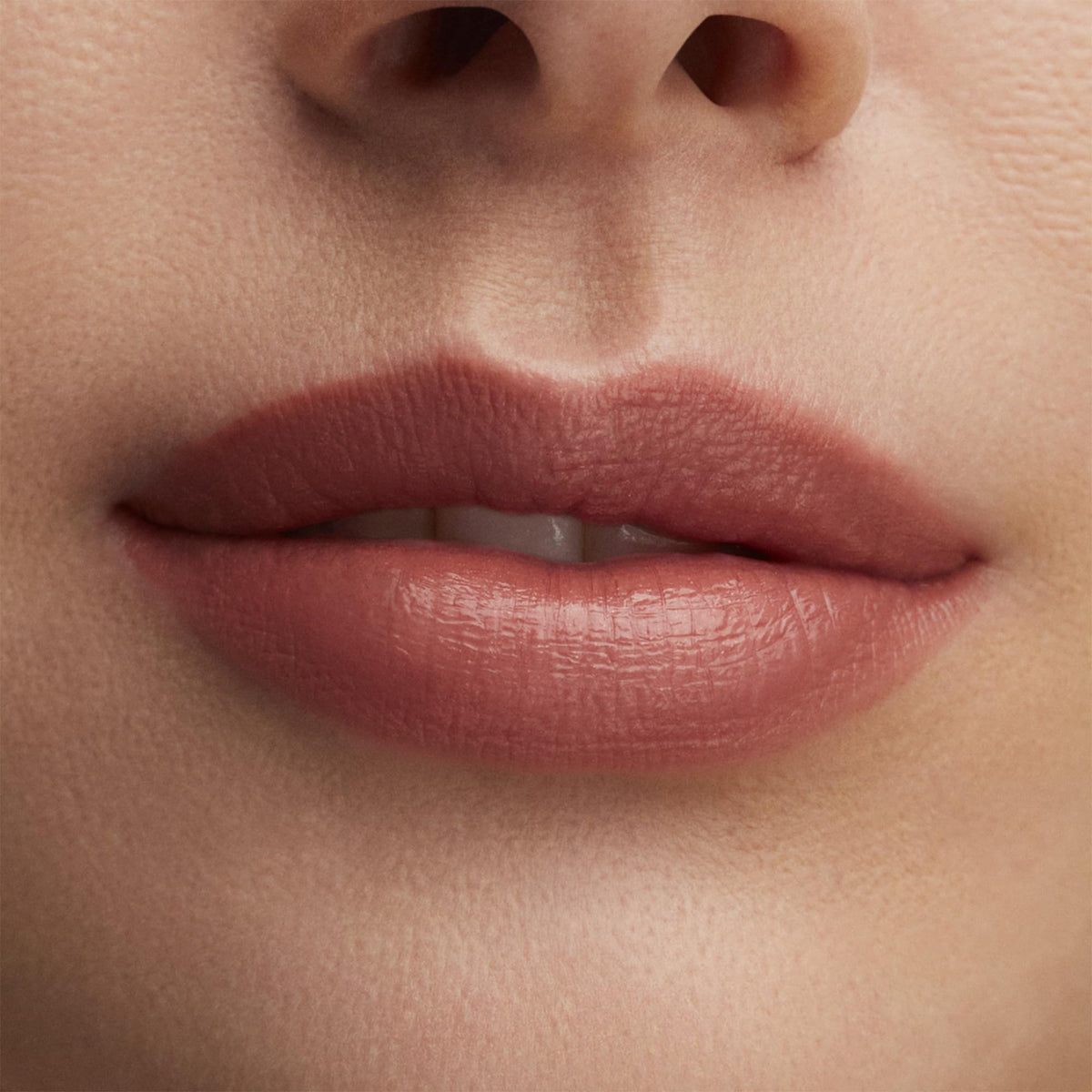 MAC Hug Me swatch texture close-up showing smooth lustre and moisturizing feel