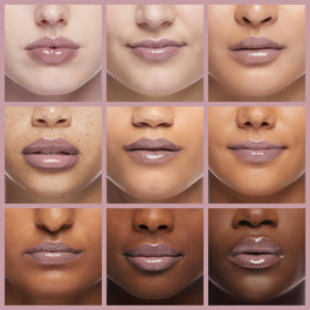 Model wearing MAC Lipglass Oyster Girl demonstrating natural glossy effect benefit