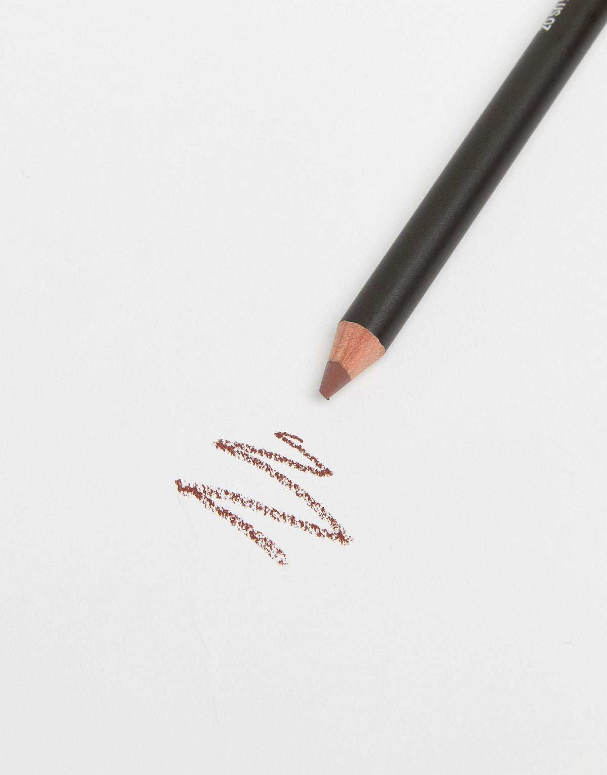MAC mahogany flat lay with lipstick and brush showing layering versatility benefit