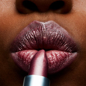 MAC texture swatch of Plum Dandy on skin showing shimmer benefit: visible pearl finish