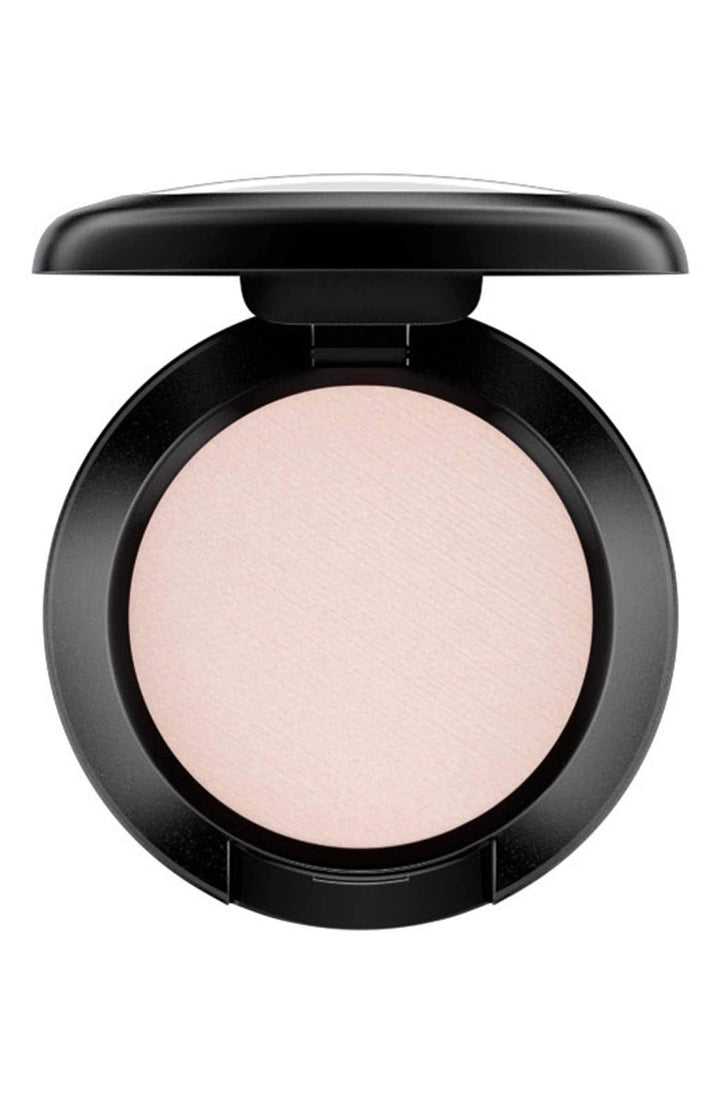 MAC Shroom front pan showing neutral shimmer and compact size for versatile use