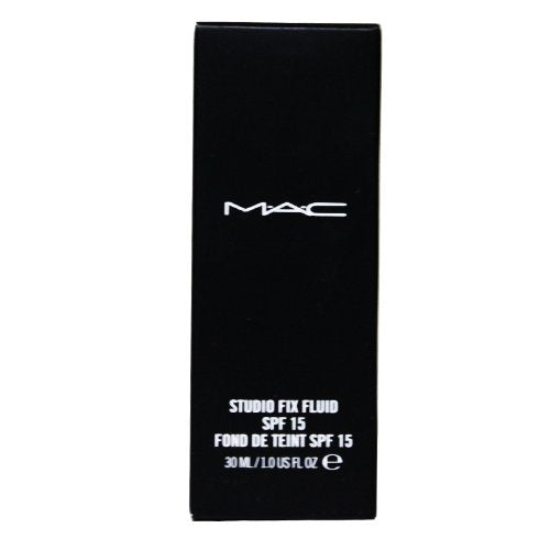 MAC Studio Fix Fluid 30ml bottle beside coin for size reference and portability