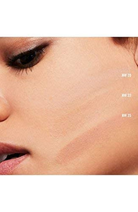 MAC compact inside a makeup bag ready for on-the-go touch-ups