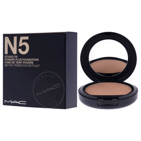 MAC Studio Fix inside a makeup bag with other essentials, highlighting portable touch-up convenience