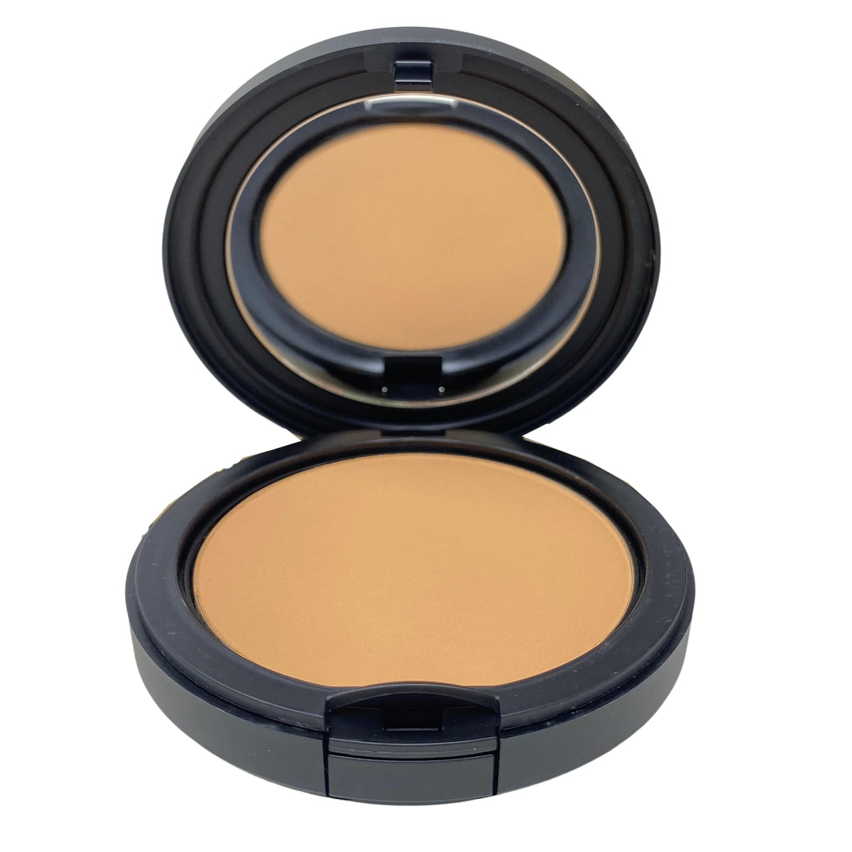 M·A·C powder texture close-up revealing fine-milled formula for smooth matte application