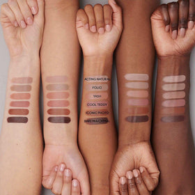 MAC Ximal lip swatch on model demonstrating warm nude beige and natural enhancement