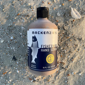 MacKenzie's lifestyle shot on boat deck showing fishermen keeping hands fresh