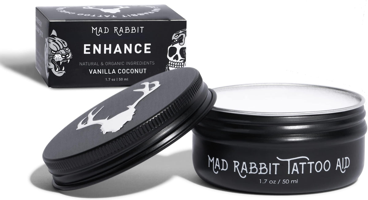Mad Rabbit Enhance Balm tube close-up showing applicator and premium texture benefits