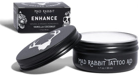 Mad Rabbit Enhance Balm tube close-up showing applicator and premium texture benefits