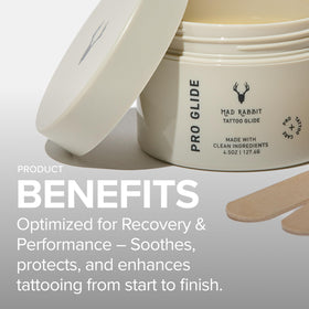 Mad Rabbit tube beside tattoo inks indicating professional-use compatibility