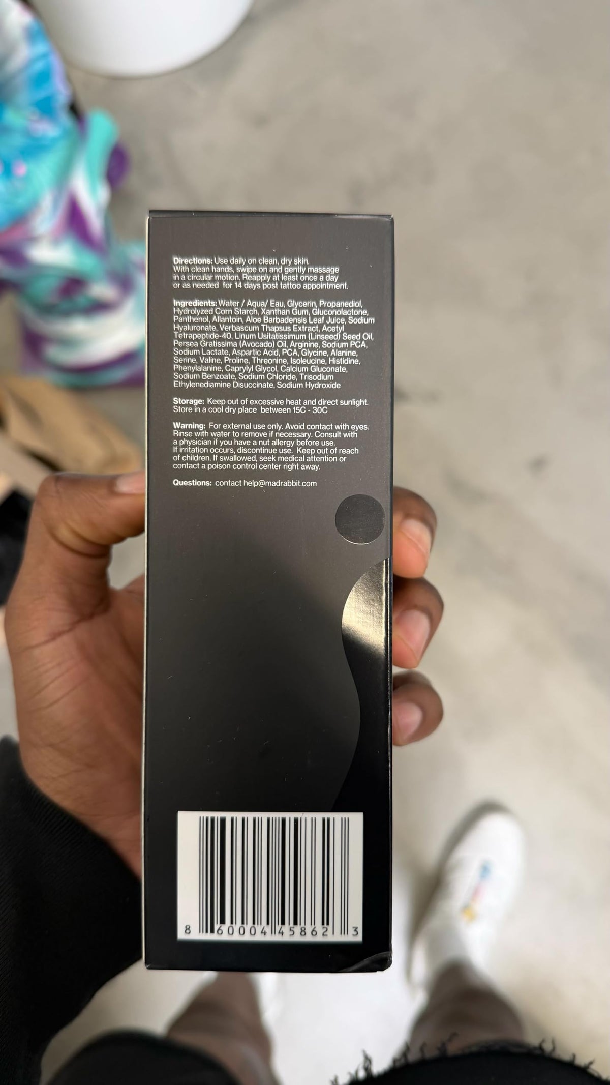 Mad Rabbit product label close-up showing key ingredients and clean formulation