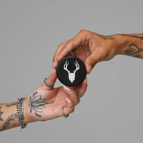 Mad Rabbit Replenish Lotion spread on forearm showing lightweight absorption and nourishment