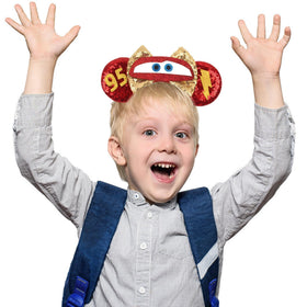 MADO red car headband in park setting showing festive photo-ready look