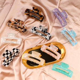 Magicsky clip used while applying makeup showing hands-free convenience and utility