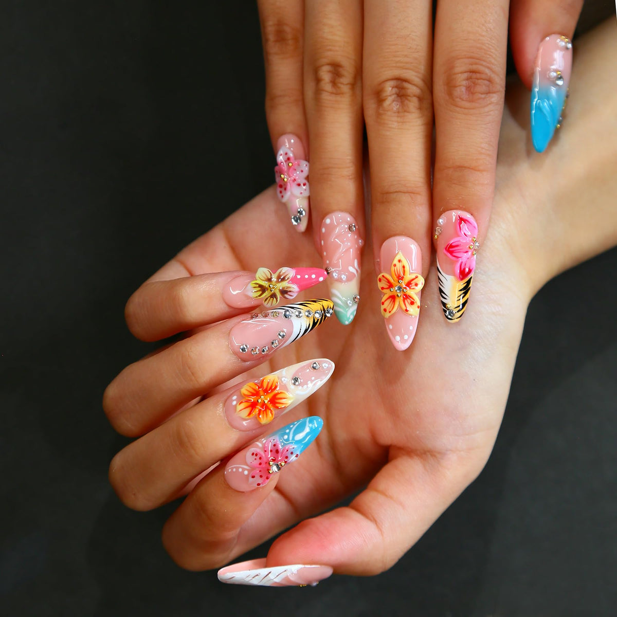 MAGLFELL nails worn on hand demonstrating stylish stiletto look and everyday wear