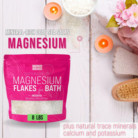 Magnum Solace flakes dissolving in bathwater for relaxing soak