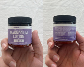 Magnum Solace size comparison with hand to show bottle scale and easy portability