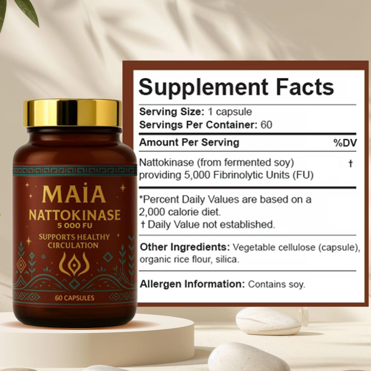 MAÏA bottle open with capsules spilling, demonstrating easy twice-daily use