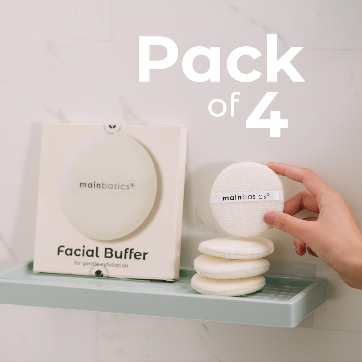 MainBasics pad on bathroom counter next to cleanser illustrating everyday routine benefit