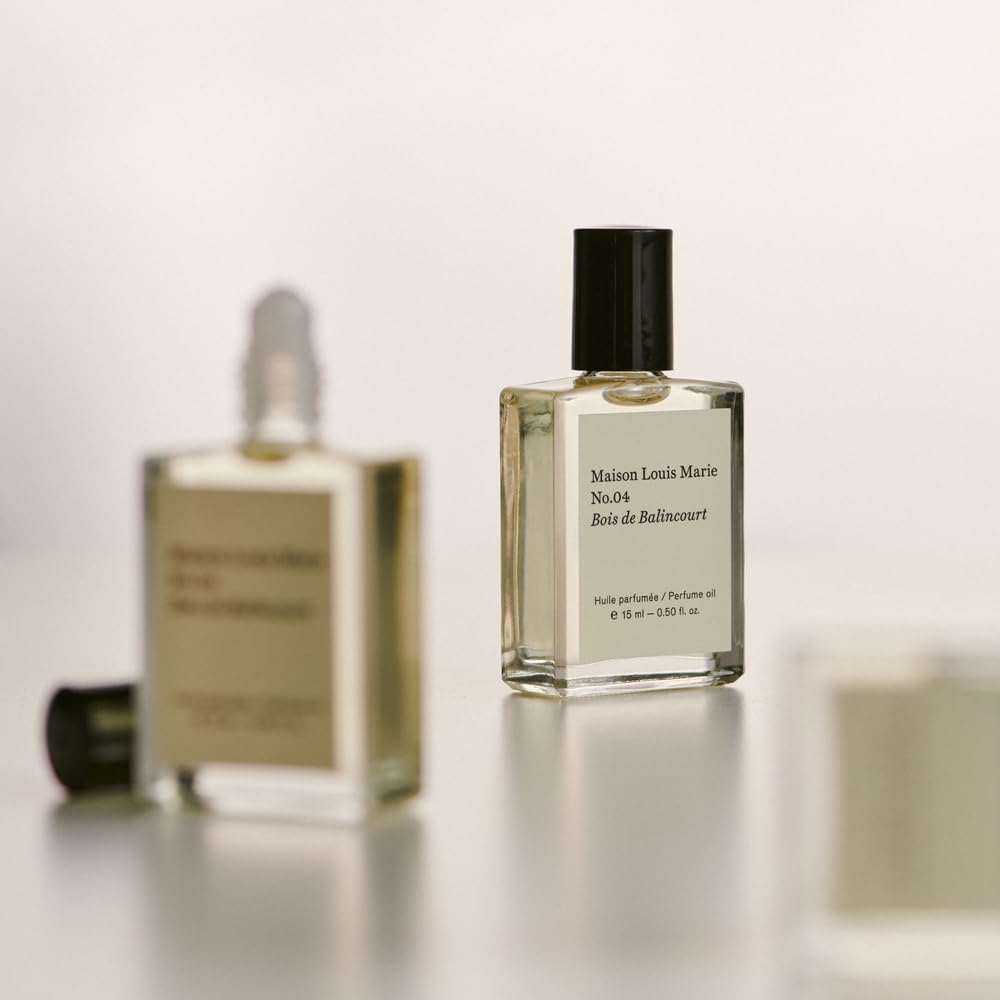 Maison Louis Marie roll-on inside a handbag illustrating everyday portability and quick touch-ups