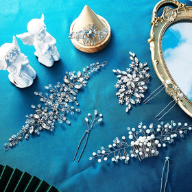 Maitys accessories beside ruler for size comparison and styling planning