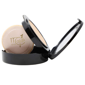Maja compact in use applying powder for quick touchups and shine control