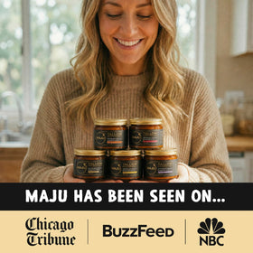 MAJU jar beside Manuka honey to highlight nourishing honey ingredient