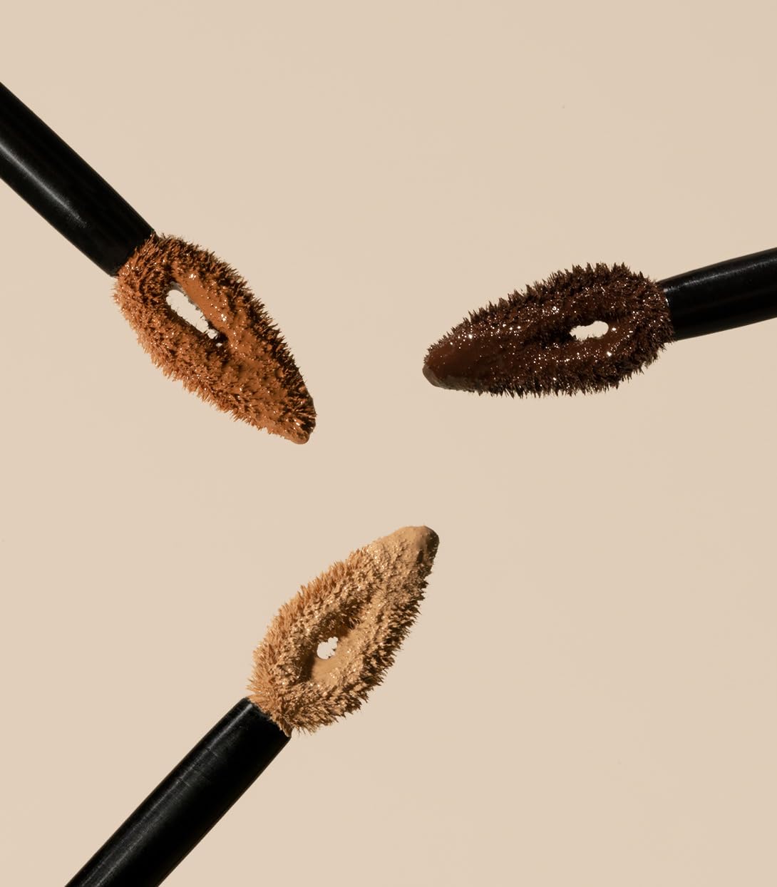 MAKE concealer on brush blending smoothly for streak-free, skin-mimetic coverage