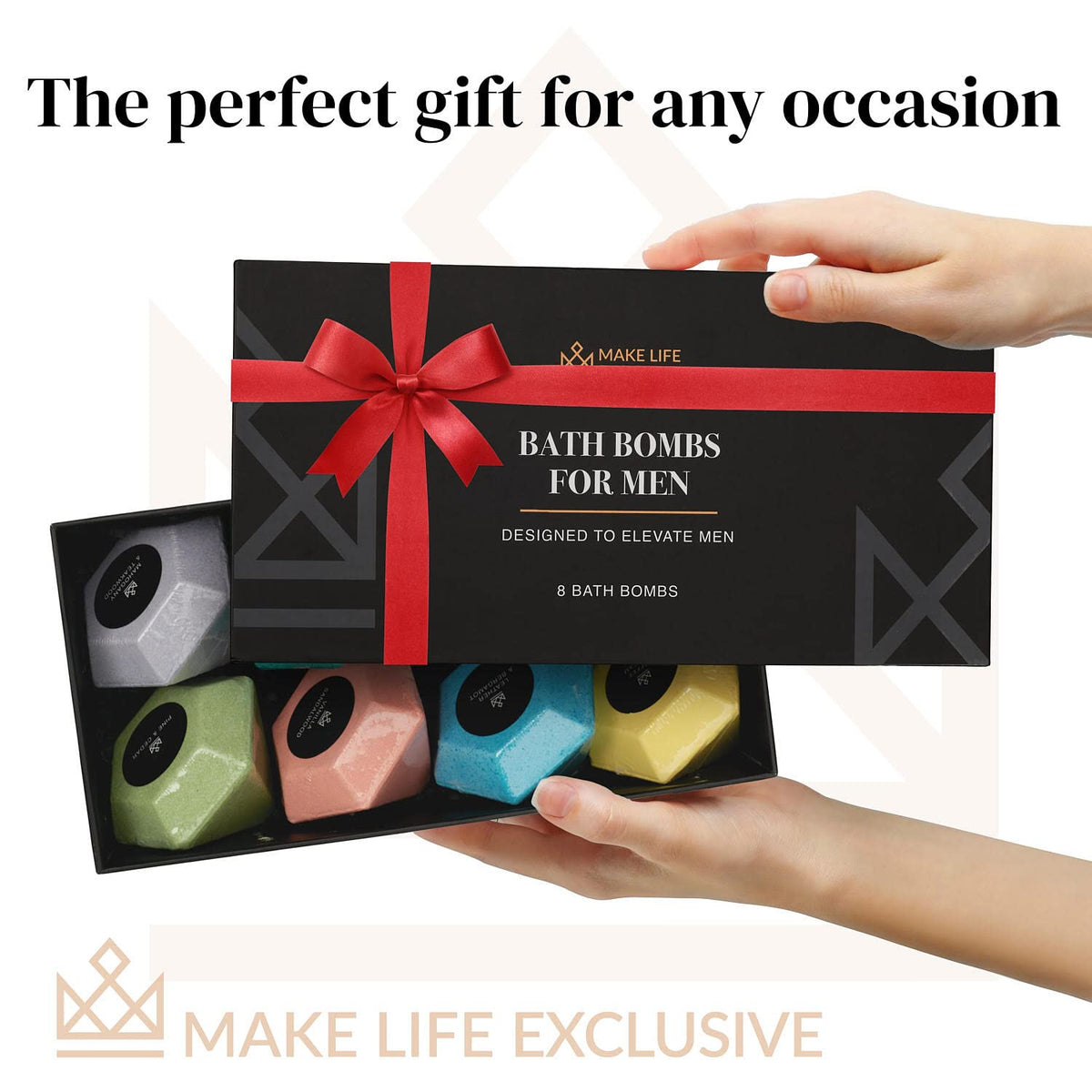 MAKE LIFE EXCLUSIVE bomb in bath bowl in use releasing scent for a relaxing soak