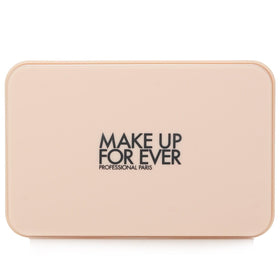 Make Up For Ever compact next to coin showing 0.38 oz travel-friendly size