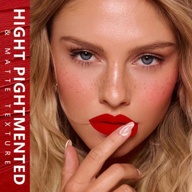 MAKI YIKA Flamingo worn on lips illustrating transfer-resistant, vibrant red benefit