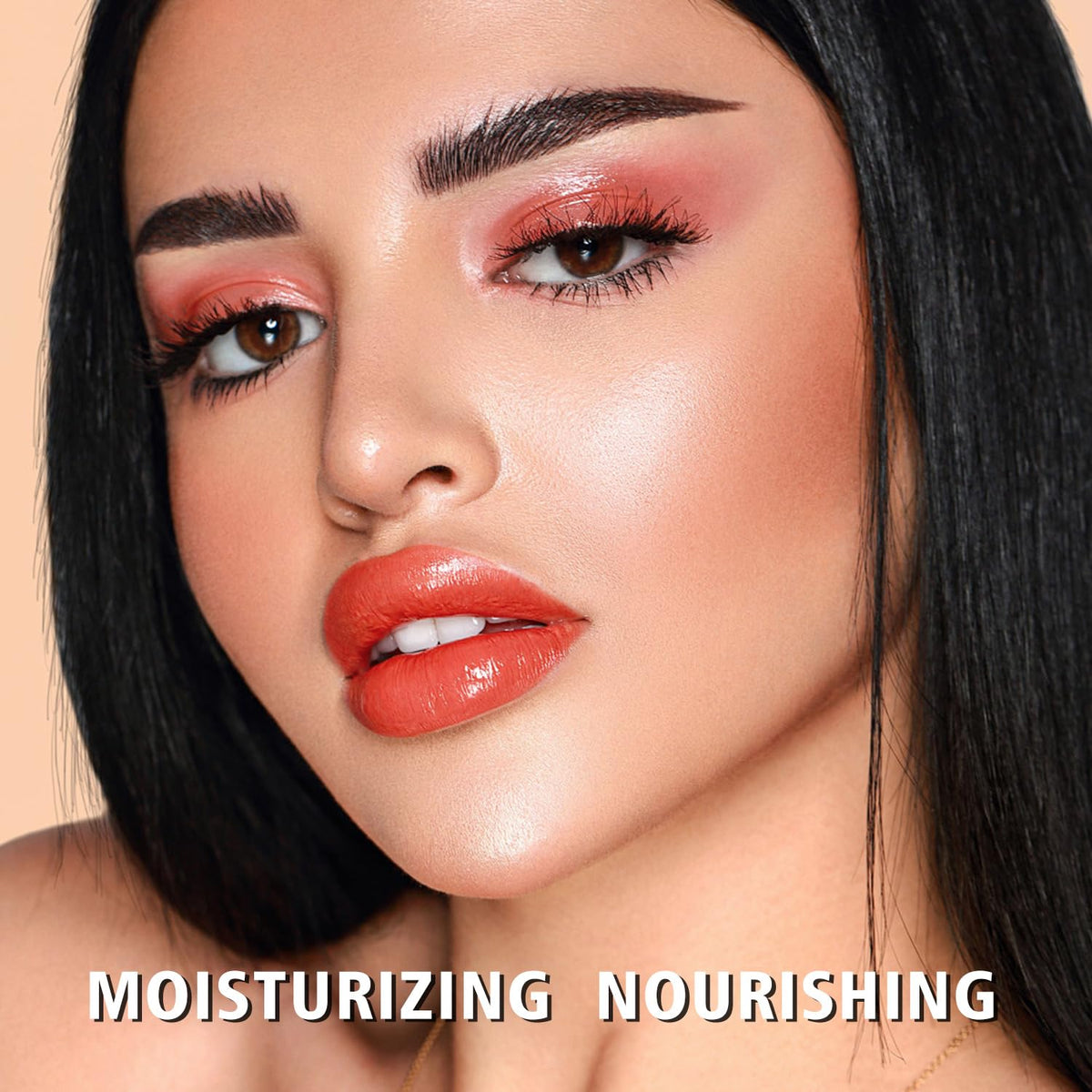 MAKI YIKA lip swatch on hand illustrating true apricot peach color payoff