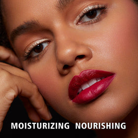 MAKI YIKA swatch on hand demonstrating buildable burgundy color