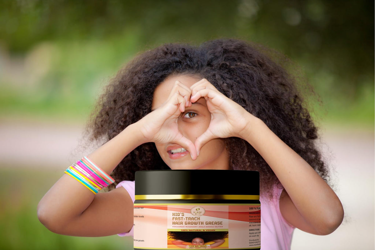 MAKOF BEAUTY being smoothed onto a child’s scalp for easier detangling and hydration