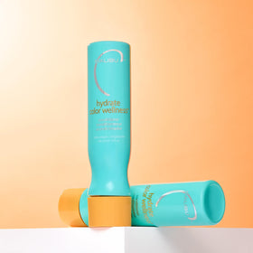 Malibu C used on color-treated woman showing vibrant hair and confidence