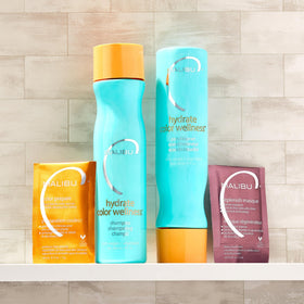 Malibu C conditioner pour texture demonstrating rich hydration and slip benefit