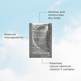 malibu c massaging treatment into scalp to soothe dryness and improve manageability