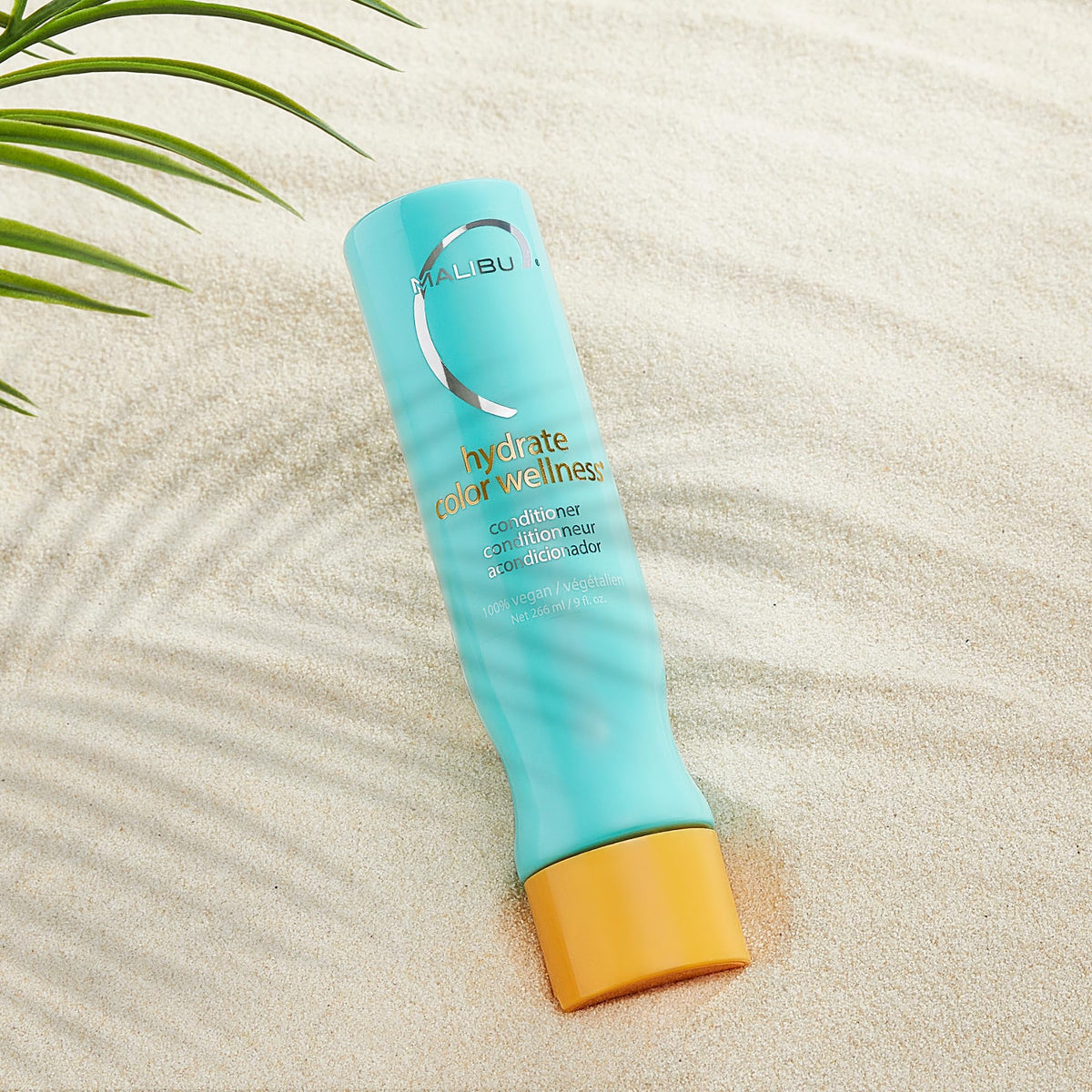 Malibu C conditioner creamy texture close-up showing hydration and slip