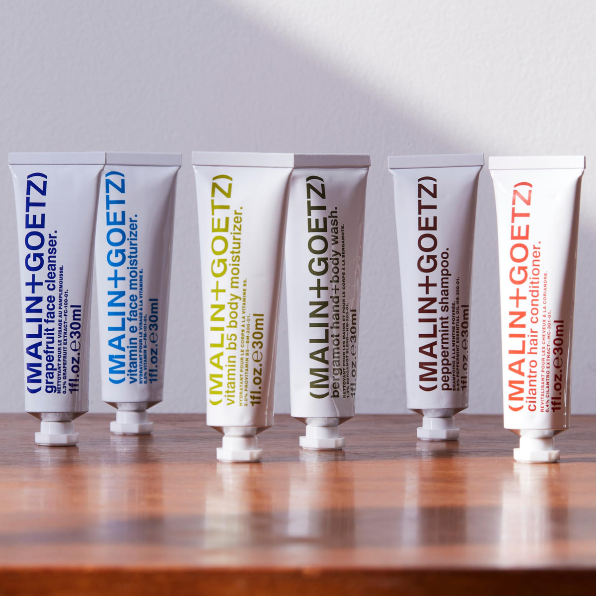 MALIN+GOETZ aluminum tube detail highlighting recyclable packaging benefit